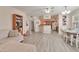 Open layout of a living area featuring wood floors and dining space at 3975 N Hualapai Way # 121, Las Vegas, NV 89129