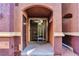 Private patio featuring a sliding glass door and stucco walls at 3975 N Hualapai Way # 121, Las Vegas, NV 89129