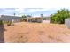 Wide shot of the expansive backyard showing patio, grass and storage shed at 409 Antelope Way, Las Vegas, NV 89145