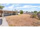 Expansive backyard with grass, patio and block wall providing privacy at 409 Antelope Way, Las Vegas, NV 89145