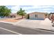 Cozy single-story home with a low-maintenance yard and a long driveway for convenient parking at 409 Antelope Way, Las Vegas, NV 89145