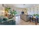 Inviting living room filled with natural light, tile floors, and ample space for plants and decor at 409 Antelope Way, Las Vegas, NV 89145