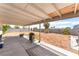 Back patio with grill and fire pit overlooking the expansive backyard at 409 Antelope Way, Las Vegas, NV 89145