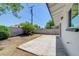 A view of a private backyard with a patio and mature landscaping, perfect for outdoor living at 4424 Sunrise Ave, Las Vegas, NV 89110