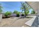Large backyard with mature trees, providing a private and serene outdoor space for relaxation and enjoyment at 4424 Sunrise Ave, Las Vegas, NV 89110