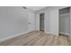 Bedroom featuring light wood-look flooring and closet doors for ample storage at 4424 Sunrise Ave, Las Vegas, NV 89110