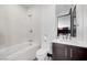This well lit bathroom has tiled walls, modern fixtures, and a tub-shower combination at 5 Highland Cove Ln, Henderson, NV 89011
