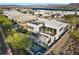 Modern home with a rooftop deck, balcony, and pool, offering stunning outdoor living spaces at 5 Highland Cove Ln, Henderson, NV 89011