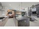 Gourmet kitchen with island open to the living room at 5 Highland Cove Ln, Henderson, NV 89011