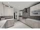 Bright kitchen with custom cabinets, stainless appliances, and stylish backsplash at 5 Highland Cove Ln, Henderson, NV 89011