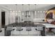 Open concept kitchen with stainless appliances and ample counter space at 5 Highland Cove Ln, Henderson, NV 89011