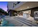 An outdoor bar adjacent to an outdoor living space with easy access to the home's interior at 5 Highland Cove Ln, Henderson, NV 89011