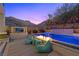 Resort-style pool and spa with waterfall features and fire pit for outdoor relaxation and entertainment at 5 Highland Cove Ln, Henderson, NV 89011