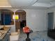 Spacious living room showing an archway into the kitchen and unique flooring design at 5068 Killarney St, Las Vegas, NV 89122
