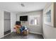 Bedroom with a closet, a window and a flat screen TV at 5117 Axbridge Ct, North Las Vegas, NV 89031