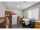 Bedroom with a window and storage featuring boxes and shelves at 5117 Axbridge Ct, North Las Vegas, NV 89031
