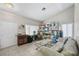 Cozy living room with tile floors, neutral walls, plenty of storage, and natural light at 5117 Axbridge Ct, North Las Vegas, NV 89031