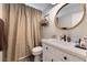 Cozy bathroom features a stylish vanity, mirror and coordinated decor at 5131 Moose Falls Dr, Las Vegas, NV 89141