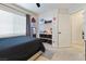 Comfortable bedroom featuring carpet floors, ceiling fan, and closet space at 5131 Moose Falls Dr, Las Vegas, NV 89141