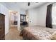 Cozy bedroom featuring a built-in vanity, comfortable bed, and neutral tones at 5131 Moose Falls Dr, Las Vegas, NV 89141