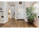 Welcoming foyer with hardwood floors, high ceilings, and a staircase at 5131 Moose Falls Dr, Las Vegas, NV 89141