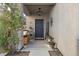 Charming front door entrance with decorative accents and covered porch at 5131 Moose Falls Dr, Las Vegas, NV 89141