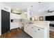 Bright kitchen with white cabinets, stainless steel appliances, and ample counter space at 5131 Moose Falls Dr, Las Vegas, NV 89141