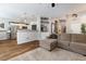 Spacious living room offering stylish built-ins, ceiling fan and open access to kitchen at 5131 Moose Falls Dr, Las Vegas, NV 89141