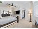 Serene main bedroom with neutral tones, leading to an en-suite bathroom at 5131 Moose Falls Dr, Las Vegas, NV 89141