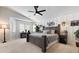 Expansive main bedroom with decorative wall accents, modern furnishings, and ample natural light at 5131 Moose Falls Dr, Las Vegas, NV 89141