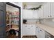 Spacious pantry with organized shelving, offering ample storage in the kitchen area at 5131 Moose Falls Dr, Las Vegas, NV 89141