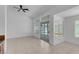 Bright living room showcasing seamless access to outdoor pool area through sliding glass doors at 519 Landra Ln, Henderson, NV 89015