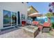 Outdoor space featuring a fire pit, outdoor seating, and landscaping at 599 Wounded Star Ave, Las Vegas, NV 89178