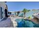 Outdoor space featuring a pool, outdoor seating, and landscaping at 599 Wounded Star Ave, Las Vegas, NV 89178