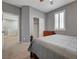 Comfortable bedroom featuring neutral walls, plush carpet, closet, and shuttered windows at 599 Wounded Star Ave, Las Vegas, NV 89178
