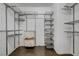 Organized walk-in closet with custom shelving and ample storage space at 599 Wounded Star Ave, Las Vegas, NV 89178