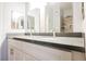 Modern bathroom featuring a double sink vanity with sleek countertops and tile shower at 6006 Vegas Dr, Las Vegas, NV 89108
