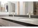 Bathroom with dual sinks, granite countertop, modern fixtures, and neutral decor at 6006 Vegas Dr, Las Vegas, NV 89108