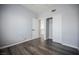 Bedroom with wood floor, closet and neutral paint at 6006 Vegas Dr, Las Vegas, NV 89108