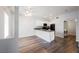 Open kitchen with sleek appliances, modern countertops, and a breakfast bar at 6006 Vegas Dr, Las Vegas, NV 89108