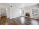 Open living room with a fireplace and modern flooring at 6006 Vegas Dr, Las Vegas, NV 89108