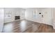 Bright living room featuring a tiled fireplace and wood-look flooring at 6006 Vegas Dr, Las Vegas, NV 89108