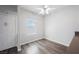 Bright room featuring wood-look floors, and a ceiling fan at 6006 Vegas Dr, Las Vegas, NV 89108