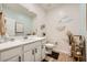 Serene bathroom featuring a single vanity, modern fixtures, and decorative elements that enhance the tranquil ambiance at 6098 Avery Pointe St, Las Vegas, NV 89166
