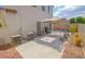 Backyard featuring a partially-covered patio and plenty of space at 6098 Darkfeather Way, Las Vegas, NV 89139