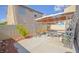 Enclosed backyard featuring a shaded patio, perfect for outdoor gatherings at 6098 Darkfeather Way, Las Vegas, NV 89139