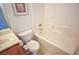 Well-lit bathroom features a shower-tub combo and vanity with sink at 6098 Darkfeather Way, Las Vegas, NV 89139