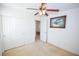 Bedroom with plush carpet, standard closet and ceiling fan at 6098 Darkfeather Way, Las Vegas, NV 89139