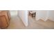 Hallway featuring carpet, and decor, offering additional seating and complementing the interior design at 6098 Darkfeather Way, Las Vegas, NV 89139