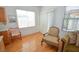 Bright kitchen nook with laminate flooring and natural light at 6098 Darkfeather Way, Las Vegas, NV 89139